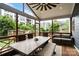 Screened patio featuring a dining table, a sofa, and an exterior view at 2217 Yadkin Ave, Charlotte, NC 28205