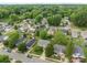 A quiet neighborhood with tree-lined streets and well-maintained homes surrounded by lush greenery at 252 Sweet Bay Nw Ln, Concord, NC 28027