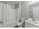 Clean bathroom with a shower-tub combo, featuring modern fixtures and a neutral palette at 252 Sweet Bay Nw Ln, Concord, NC 28027