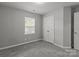 Cozy bedroom features ample natural light from a well-placed window at 252 Sweet Bay Nw Ln, Concord, NC 28027