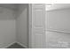 Well-lit closet features practical shelving, offering great storage and organization possibilities at 252 Sweet Bay Nw Ln, Concord, NC 28027