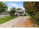 Charming home featuring gray siding, well-kept front yard and a paved driveway at 252 Sweet Bay Nw Ln, Concord, NC 28027