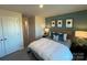 Comfortable bedroom with a serene ambiance and natural light from the window at 300 Laura Elizabeth Ln, Clover, SC 29710