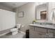 Clean bathroom with a shower/tub combination, granite vanity, and gray tile floors at 3009 Lydney Cir, Waxhaw, NC 28173