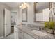 Bathroom featuring granite countertops, double sinks, and neutral walls at 3009 Lydney Cir, Waxhaw, NC 28173
