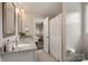 Well-lit bathroom features granite countertops and white vanity at 3009 Lydney Cir, Waxhaw, NC 28173