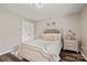 Bright bedroom with decorative wall art and hardwood floors, creating an inviting space at 3009 Lydney Cir, Waxhaw, NC 28173