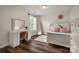 Bright, spacious bedroom showcasing hardwood floors and a vanity area at 3009 Lydney Cir, Waxhaw, NC 28173