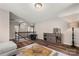 Upstairs bonus room featuring hardwood floors, overhead lighting, and hallway access at 3009 Lydney Cir, Waxhaw, NC 28173