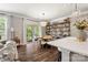 Cozy breakfast nook with access to a patio, adjacent to the open-concept kitchen at 3009 Lydney Cir, Waxhaw, NC 28173