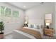 Cozy bedroom with natural light, neutral paint, and stylish furnishings at 3034 Finchborough Ct # 233, Charlotte, NC 28269