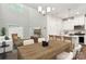 Bright open floor plan offers a seamless flow with high ceilings and wood flooring at 3034 Finchborough Ct # 233, Charlotte, NC 28269