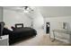 Cozy bedroom features neutral walls, carpet, and an adjacent dressing area with mirrored closet at 3071 Des Prez Ave, Fort Mill, SC 29707