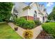 Charming home with lush landscaping, manicured bushes, and a well-maintained walkway at 3071 Des Prez Ave, Fort Mill, SC 29707