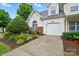 Home's exterior featuring well-maintained landscaping and an attached one car garage at 3071 Des Prez Ave, Fort Mill, SC 29707