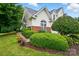 Charming home with lush landscaping, manicured bushes, and a well-maintained lawn at 3071 Des Prez Ave, Fort Mill, SC 29707