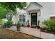 Charming front porch with seating area, potted plants, and a welcoming entryway at 3071 Des Prez Ave, Fort Mill, SC 29707