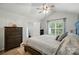 Spacious bedroom with vaulted ceilings, large window, wood floors, and neutral decor, creating a serene retreat at 3071 Des Prez Ave, Fort Mill, SC 29707