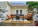 Cozy backyard patio features outdoor seating, a fire pit, and manicured landscaping, perfect for entertaining at 3071 Des Prez Ave, Fort Mill, SC 29707