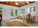 Finished basement featuring a dining area, exposed ceiling, and direct access to the backyard at 308 Odell St, Kannapolis, NC 28083