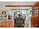 Dining area featuring hardwood floors and connections to kitchen and living spaces at 308 Odell St, Kannapolis, NC 28083