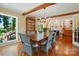 Dining room boasts hardwood floors, wood beams and connects to the adjacent living room at 308 Odell St, Kannapolis, NC 28083