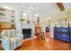 Inviting living room with fireplace, built-in shelving, and hardwood floors, providing a cozy atmosphere at 308 Odell St, Kannapolis, NC 28083