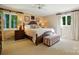 Spacious main bedroom with a king bed, neutral walls, and plenty of natural light at 308 Odell St, Kannapolis, NC 28083