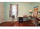 Bright bedroom features hardwood flooring, natural light and versatile space at 329 Highland Dr, Lincolnton, NC 28092