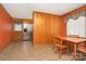 Dining space with a stainless steel refrigerator and a wooden dining set at 3526 Craig Ave, Charlotte, NC 28211