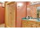 Bathroom features an antique vanity and shower with curtain at 3998 Holly Springs Dr # 20, Newton, NC 28658