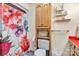 This bathroom is furnished with shelving, a curtained shower, and a bright pink counter top at 3998 Holly Springs Dr # 20, Newton, NC 28658