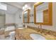 Large primary bath featuring double vanity, a soaking tub, and separate glass enclosed shower at 3998 Holly Springs Dr # 20, Newton, NC 28658