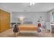 Cozy bedroom features a comfortable bed, a window, and carpeted flooring at 3998 Holly Springs Dr # 20, Newton, NC 28658