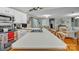 Spacious kitchen featuring light countertops, a large sink, and an open view to the living area at 3998 Holly Springs Dr # 20, Newton, NC 28658