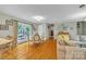Open concept living space with hardwood floors and access to outdoor patio at 3998 Holly Springs Dr # 20, Newton, NC 28658