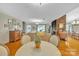 Bright living room with hardwood floors and a brick fireplace at 3998 Holly Springs Dr # 20, Newton, NC 28658