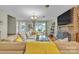 Comfortable living room with brick fireplace and natural light at 3998 Holly Springs Dr # 20, Newton, NC 28658