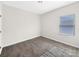 Cozy bedroom with plush carpeting and natural light, offering a blank canvas for personalized decor at 4026 Honey Locust Dr, Charlotte, NC 28215