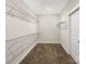 Walk-in closet with carpeted floor and wire shelving provides ample storage space at 4026 Honey Locust Dr, Charlotte, NC 28215