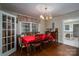 Elegant dining room with a large window and hardwood floors at 411 Hanna St, Gastonia, NC 28052