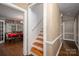 Hallway view with access to the dining room and stairway at 411 Hanna St, Gastonia, NC 28052