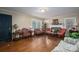 Inviting living room with hardwood floors, fireplace, and natural light at 411 Hanna St, Gastonia, NC 28052