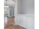 View of the open-concept living room with hardwood floors, natural light, and classic architectural details at 425 1St Se Ave, Hickory, NC 28602