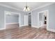 Spacious living room featuring hardwood floors, white trim, and elegant fixtures at 425 1St Se Ave, Hickory, NC 28602