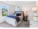 Inviting bedroom featuring a plush bed, natural light, and coordinated decor for a restful retreat at 4400 Dusty Orchard Rd, Kannapolis, NC 28081
