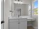 Bathroom vanity features a modern sink and mirror, with a view of the outside and ample counter space at 4419 Splash Trl # 158, Sherrills Ford, NC 28673