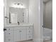 Bright bathroom with modern vanity, elegant mirror, and well-lit space at 4419 Splash Trl # 158, Sherrills Ford, NC 28673