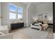 Bright primary bedroom with modern decor, furniture, and large windows at 4419 Splash Trl # 158, Sherrills Ford, NC 28673
