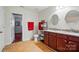 Bathroom featuring double sinks with granite counters and plenty of storage space at 512 Nanny Point Dr, Monroe, NC 28110